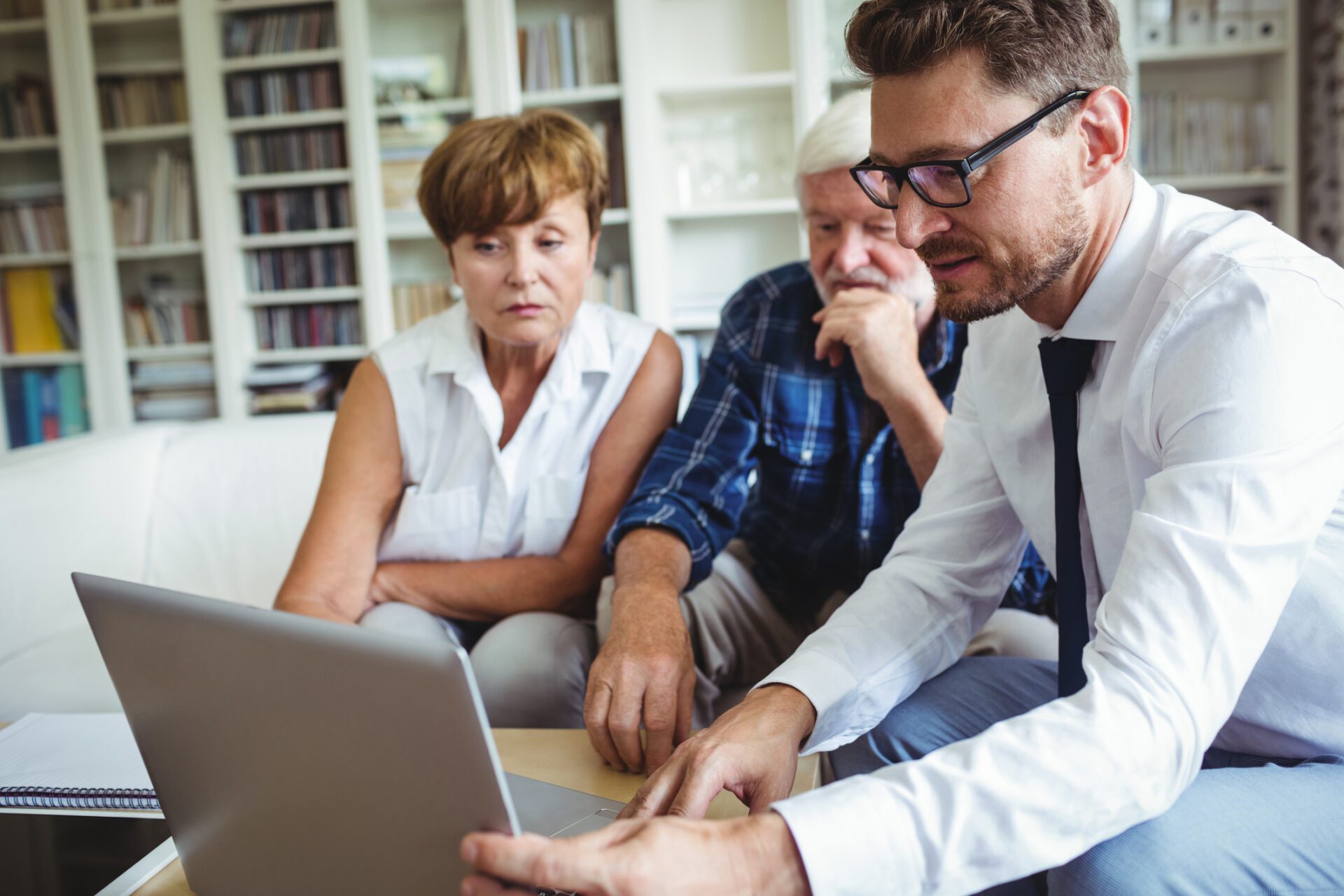 Couple meeting with home survey advisor